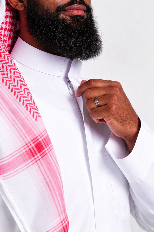 Man wearing a classic white thobe with a red shemagh for Eid in Australia